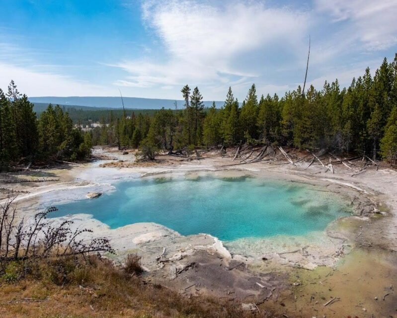 Geologic features are part of any Yellowstone itinerary | Blue hot spring pool at Norris Geyser Basin, Yellowstone