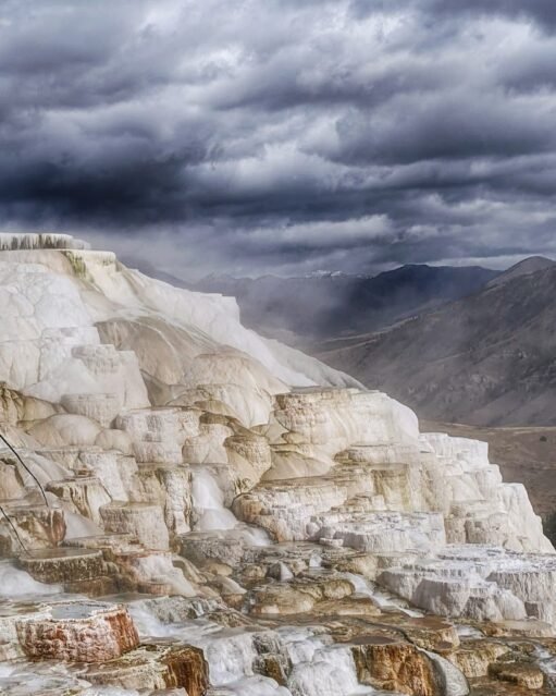 A must-see on your Yellowstone Itinerary: White travertine formations at Mammoth Hot Springs