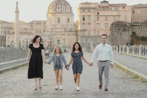 mother and child walking in Rome with kids