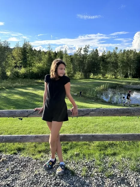 Little girl taking in the view at Von Trapp Family Brewery, one of the best family-friendly restaurants in Stowe, VT 