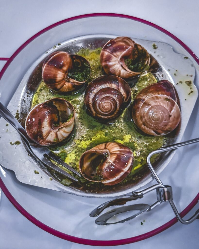 Plate of escargot at Bouillon Pigalle