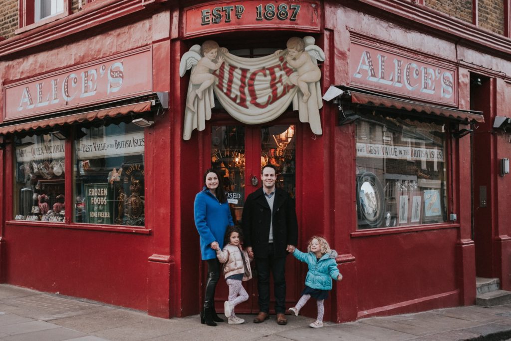 London is an ideal choice for a family trip to Europe.

Mother, father, and two young daughters posing for a photo in front of Alice's in London