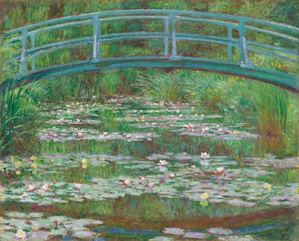 Monet's The Japanese Footbridge, 1899 - impressionistic painting of a bridge over water lilies